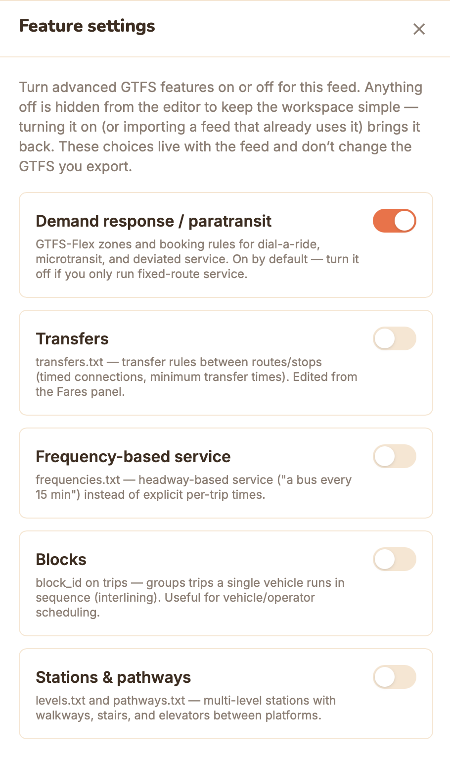 The Feature settings panel in GTFS·X, showing toggles for Demand response / paratransit (on), Transfers, Frequency-based service, Blocks, and Stations & pathways.